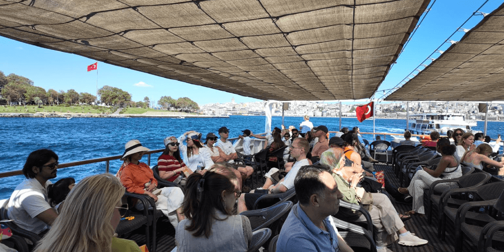 Istanbul Bosphorus cruise boat during daytime sightseeing tour with meal included