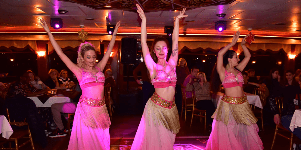 Luxury Bosphorus cruise decorated for New Year’s Eve celebration with festive lighting”