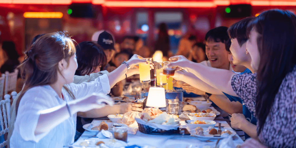 Romantic candlelit dinner setup on Bosphorus cruise during New Year celebration in Istanbul