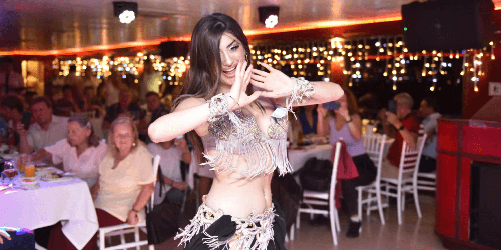 Turkish night show with belly dance performance on Bosphorus New Year cruise in Istanbul
