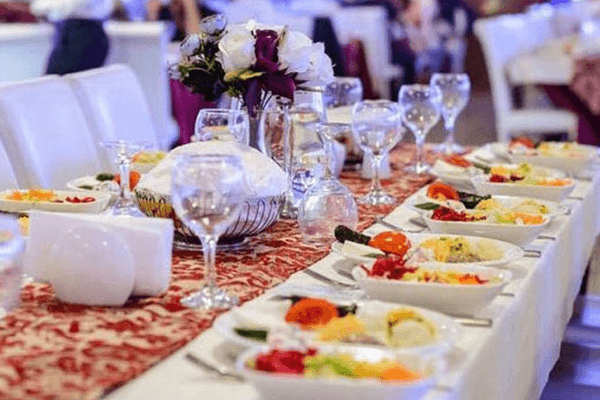 Dinner tables set up on luxury yacht for Turkish night cruise
