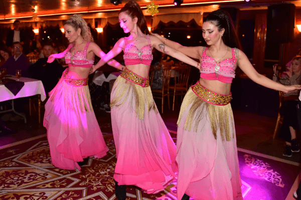 Belly dance trio entertaining guests on Bosphorus dinner cruise
