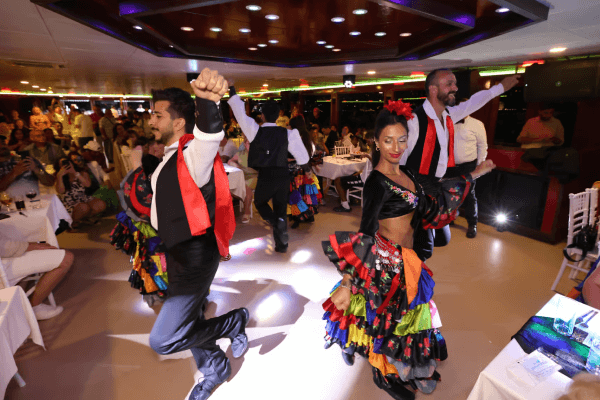 Group of gypsy dancers entertaining guests on Bosphorus dinner cruise